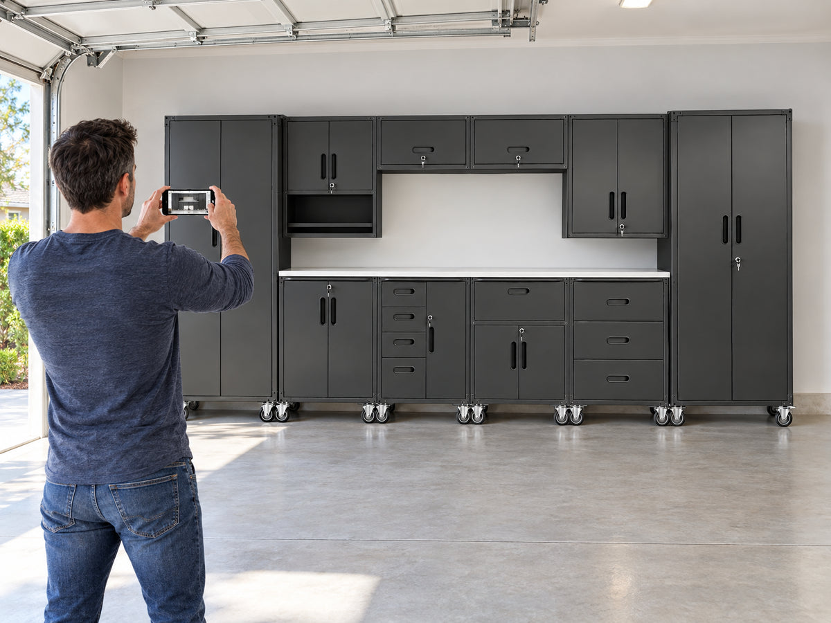 10-Piece Heavy Duty Steel Garage, man photographs the full cabinet wall with his phone, arm extended